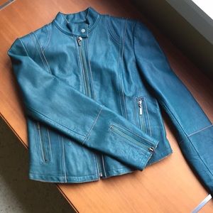 Wilson’s vintage teal leather moto jacket.
